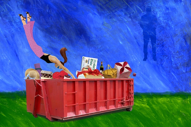 A woman wearing high heels and pink pants dives into a red dumpster filled with various items, set against a blue background with a grassy green foreground.